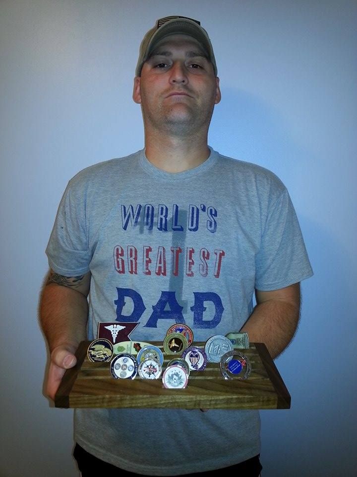 Matthew Ostrowski with a Patriot Woodworker Coin Display Matthew Ostrowski with a Patriot Woodworker Coin Display