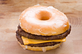 https://images.duckduckgo.com/iu/?u=http%3A%2F%2Fcdn.sheknows.com%2Farticles%2F2012%2F09%2Ftop-10-wildest-burger-ingredients-donut.jpg&f=1