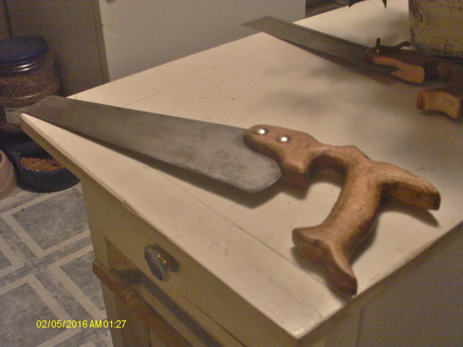 56b4453e2682c_newhandle.thumb.JPG.bf7e7e