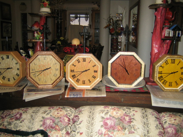 5 hanging clocks.jpg