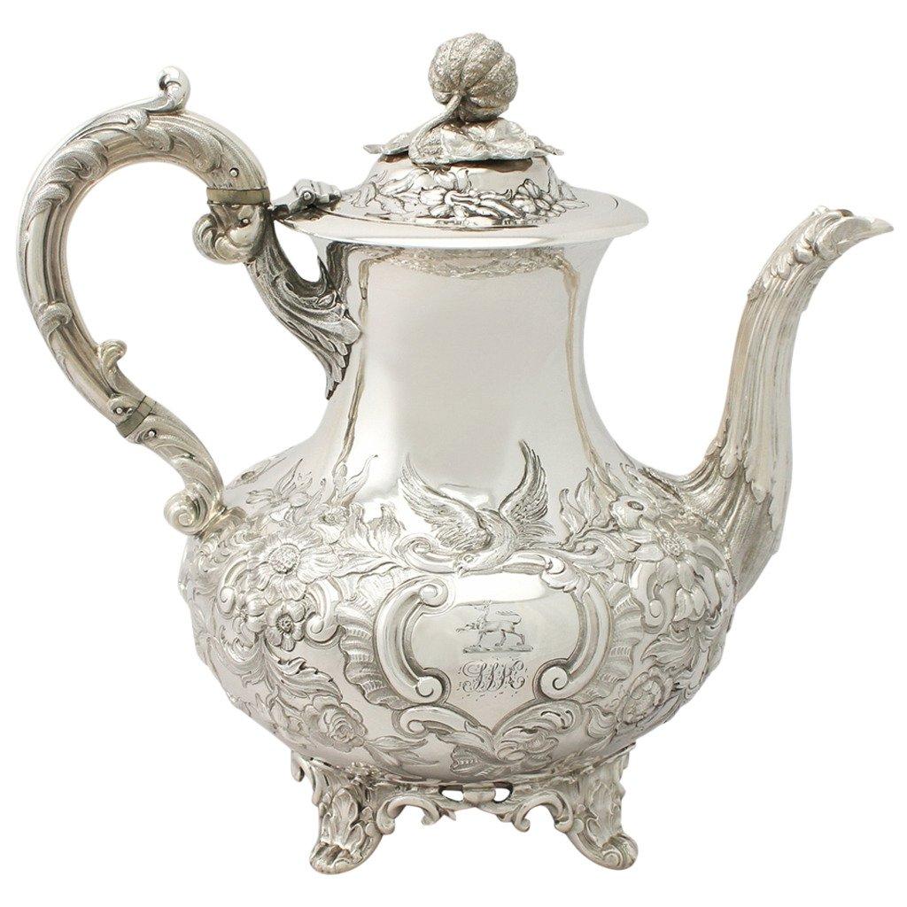 1999946559_2283582-1silverteapot.jpeg.f3d4bacdabb82ef0ef59628f3833e71b.jpeg