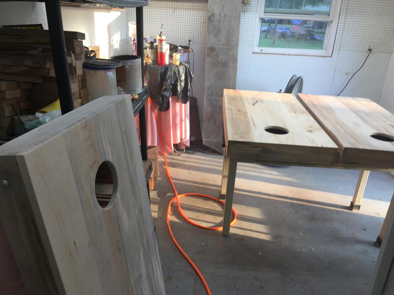 Corn hole boards in the finishing room.JPG