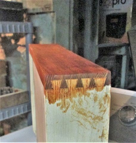 1254265252_Leftoverscleaneddovetailsstained.JPG.43693ea94eeba6615138e55826e1dba5.JPG