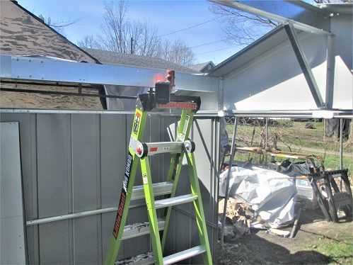 1260105521_ShedRoofProject4thcornerladderanddrill.JPG.93996568d65e64e6038bd9903a933749.JPG