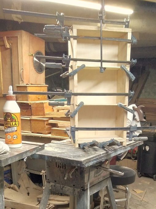 DVDCaseGlue-upforestofclamps.jpg.0f92019c0517f6ee645c0c3aa95b3d84.jpg