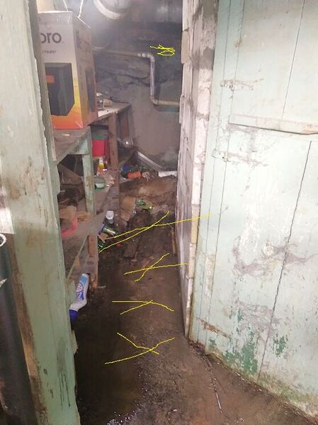 Basement, Part 2, cleared out to the drains  .jpg